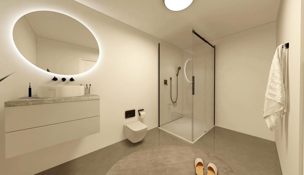 Modernes Badezimmer einer Mietwohnung am Zum Rehmer Eck in Bad Oeynhausen – bodenebene Dusche mit Glasabtrennung, wandhängender Waschtisch und beleuchteter Rundspiegel.