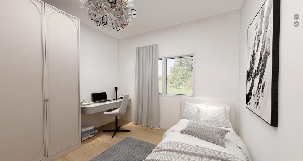 Kinderzimmer einer Mietwohnung am Zum Rehmer Eck in Bad Oeynhausen – Einzelbett, Schreibtisch und Einbauschrank, 3-fach-verglastes Fenster mit Grünblick.