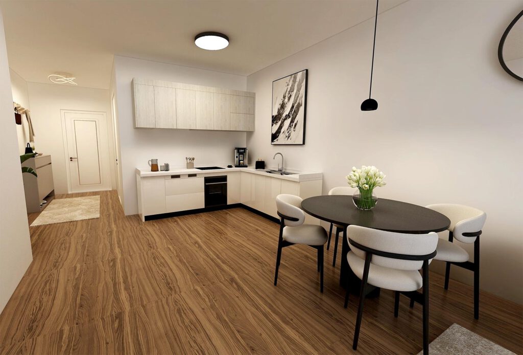 Offene Wohnküche einer 2-Zimmer-Mietwohnung am Zum Rehmer Eck in Bad Oeynhausen – L-Küche mit Vinylboden, Essbereich und Blick in den Flur, KfW-Effizienzhaus 55.