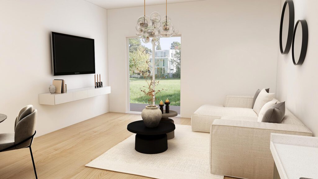 Wohnbereich einer Erdgeschosswohnung am Zum Rehmer Eck in Bad Oeynhausen – Sofa, Terrassentür mit direktem Grünblick, heller Holzboden und Fußbodenheizung.